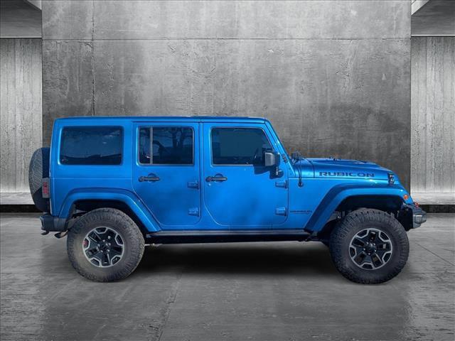 used 2015 Jeep Wrangler Unlimited car, priced at $22,991