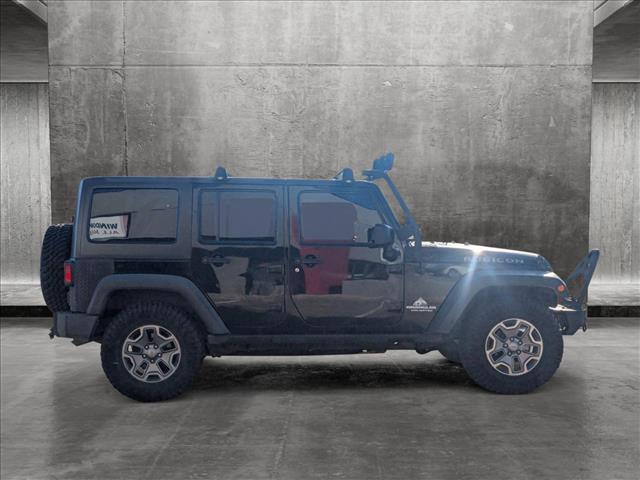 used 2015 Jeep Wrangler Unlimited car, priced at $22,690