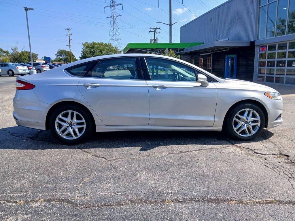 used 2014 Ford Fusion car, priced at $5,999