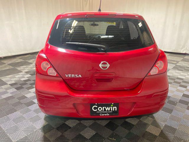 used 2010 Nissan Versa car, priced at $5,000