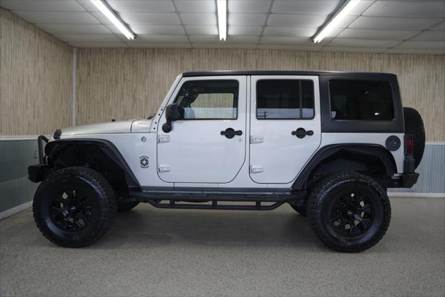 used 2012 Jeep Wrangler Unlimited car, priced at $15,475