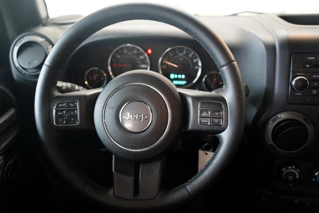 used 2015 Jeep Wrangler Unlimited car, priced at $16,375