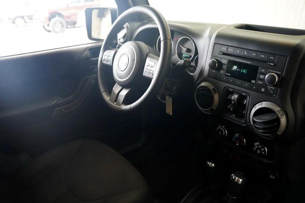 used 2015 Jeep Wrangler Unlimited car, priced at $16,375