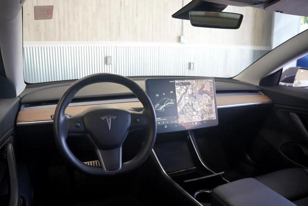 used 2018 Tesla Model 3 car, priced at $23,875