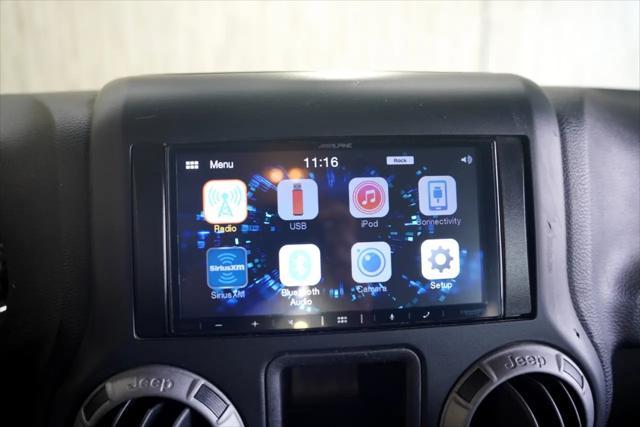used 2015 Jeep Wrangler Unlimited car, priced at $16,875