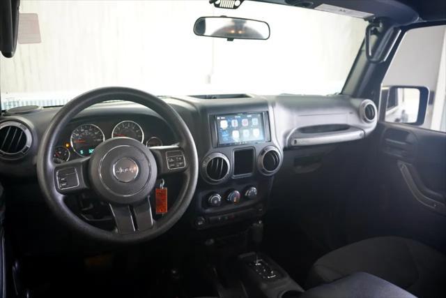 used 2015 Jeep Wrangler Unlimited car, priced at $16,875
