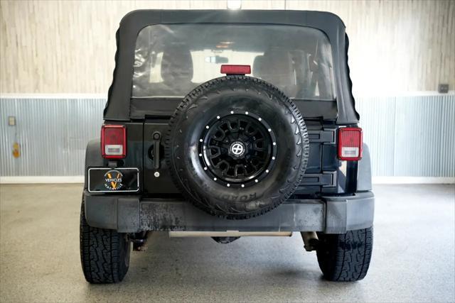 used 2015 Jeep Wrangler Unlimited car, priced at $16,875