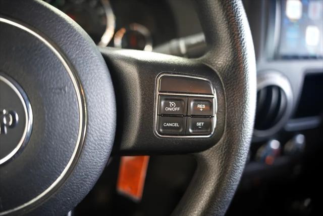 used 2015 Jeep Wrangler Unlimited car, priced at $16,875