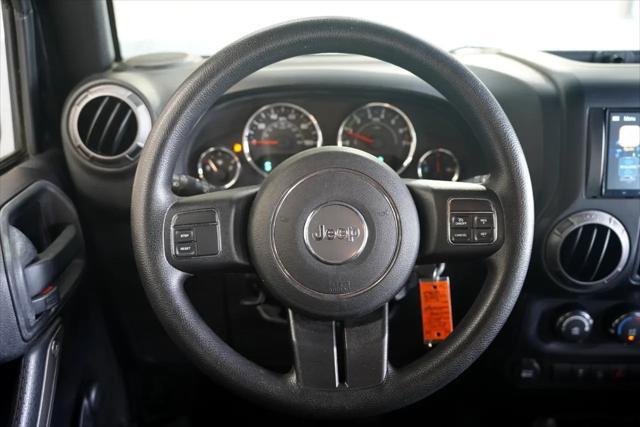 used 2015 Jeep Wrangler Unlimited car, priced at $16,875