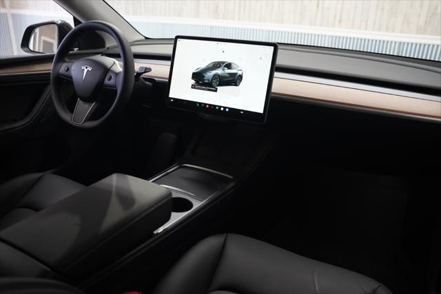 used 2025 Tesla Model Y car, priced at $41,675