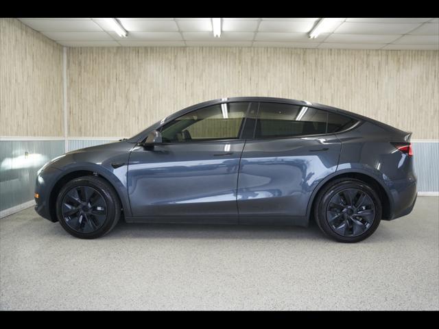 used 2025 Tesla Model Y car, priced at $41,675