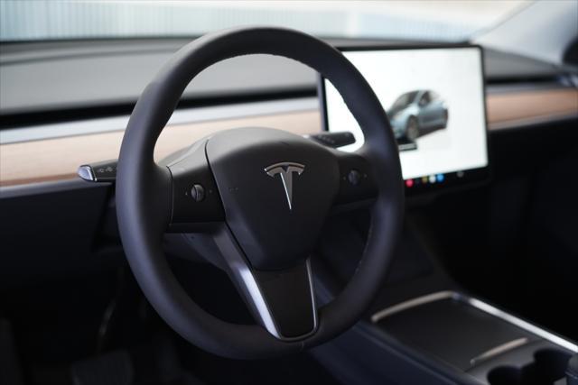 used 2025 Tesla Model Y car, priced at $41,675