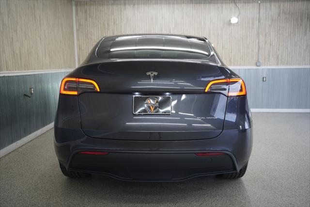 used 2025 Tesla Model Y car, priced at $41,675