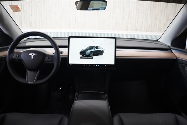 used 2025 Tesla Model Y car, priced at $41,675