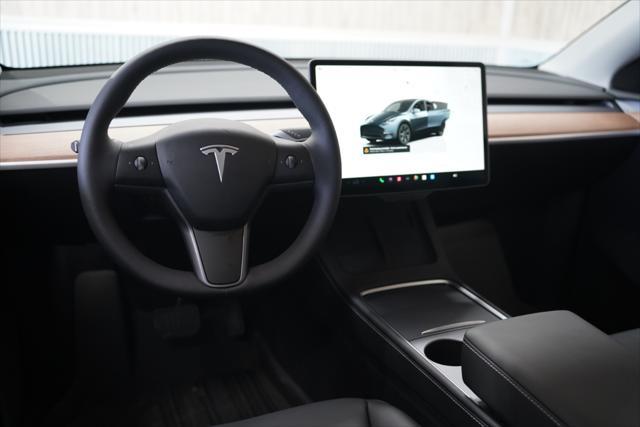 used 2025 Tesla Model Y car, priced at $41,675