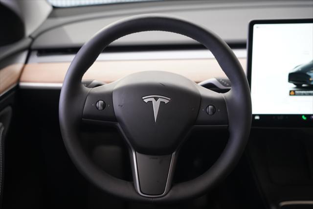 used 2025 Tesla Model Y car, priced at $41,675