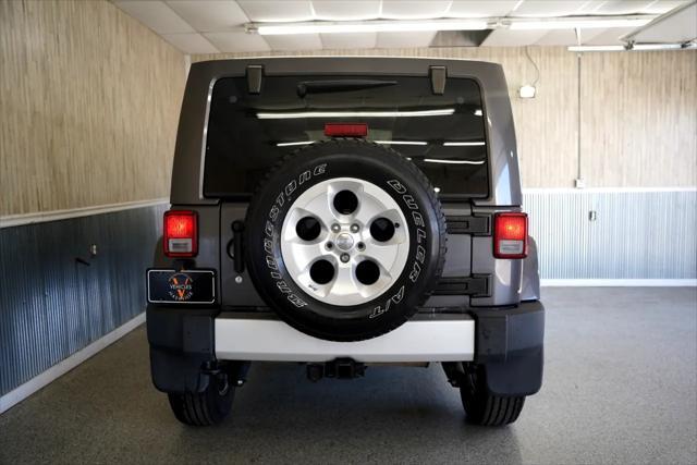 used 2014 Jeep Wrangler Unlimited car, priced at $16,875