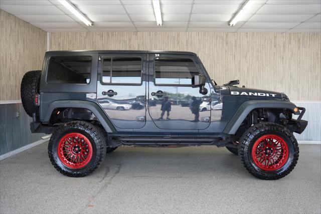 used 2016 Jeep Wrangler Unlimited car, priced at $16,975