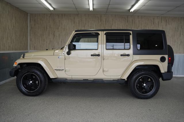 used 2011 Jeep Wrangler Unlimited car, priced at $14,275