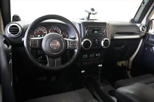 used 2011 Jeep Wrangler Unlimited car, priced at $14,275