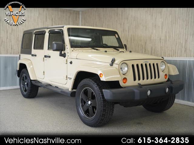 used 2011 Jeep Wrangler Unlimited car, priced at $14,275