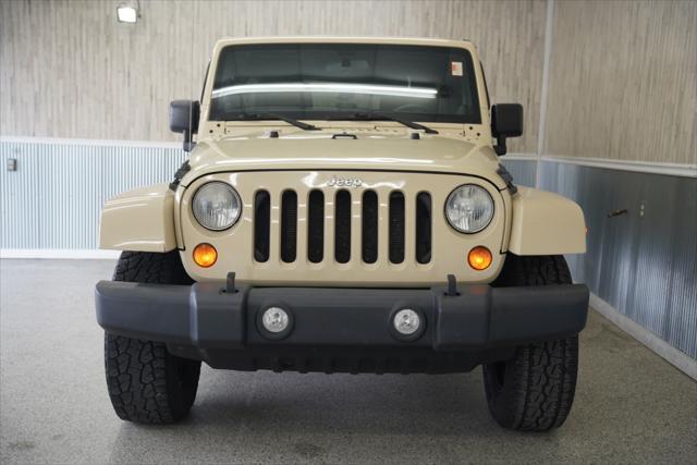 used 2011 Jeep Wrangler Unlimited car, priced at $14,275