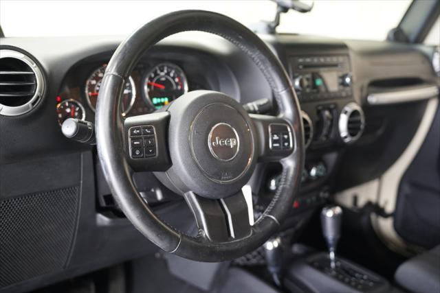 used 2011 Jeep Wrangler Unlimited car, priced at $14,275