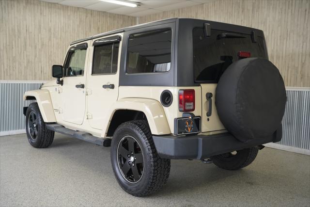 used 2011 Jeep Wrangler Unlimited car, priced at $14,275