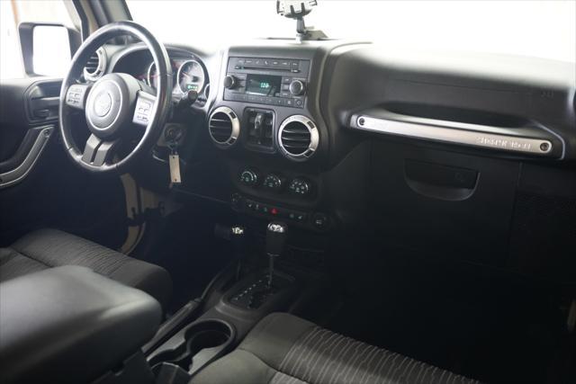 used 2011 Jeep Wrangler Unlimited car, priced at $14,275