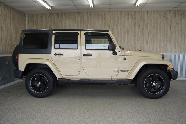 used 2011 Jeep Wrangler Unlimited car, priced at $14,275