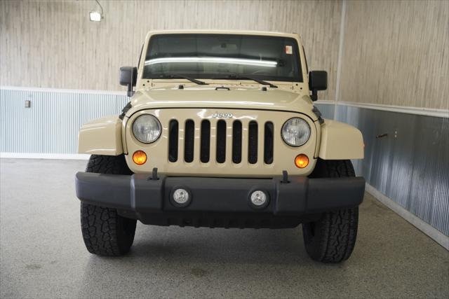 used 2011 Jeep Wrangler Unlimited car, priced at $14,275