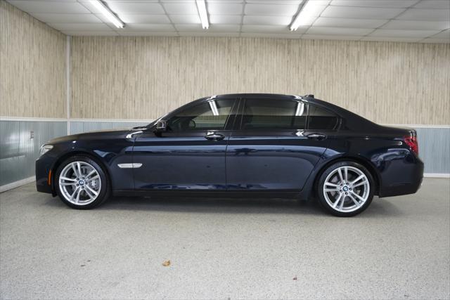 used 2015 BMW 750 car, priced at $13,875