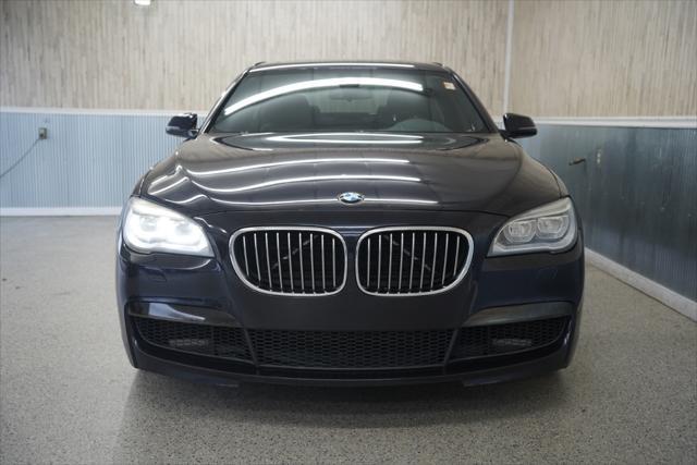 used 2015 BMW 750 car, priced at $13,875