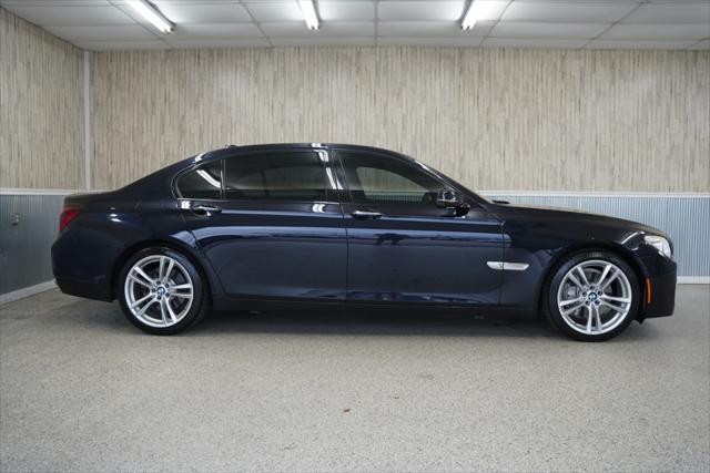 used 2015 BMW 750 car, priced at $13,875