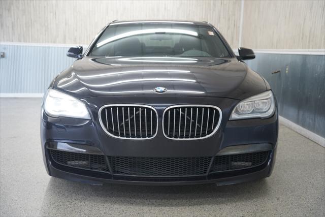 used 2015 BMW 750 car, priced at $13,875