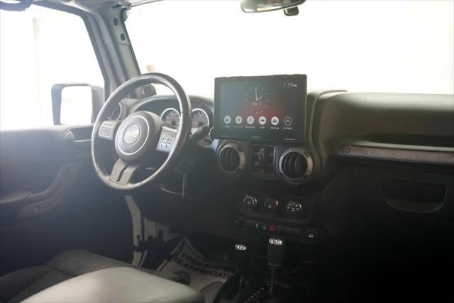 used 2011 Jeep Wrangler Unlimited car, priced at $16,875