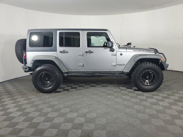 used 2013 Jeep Wrangler Unlimited car, priced at $26,671