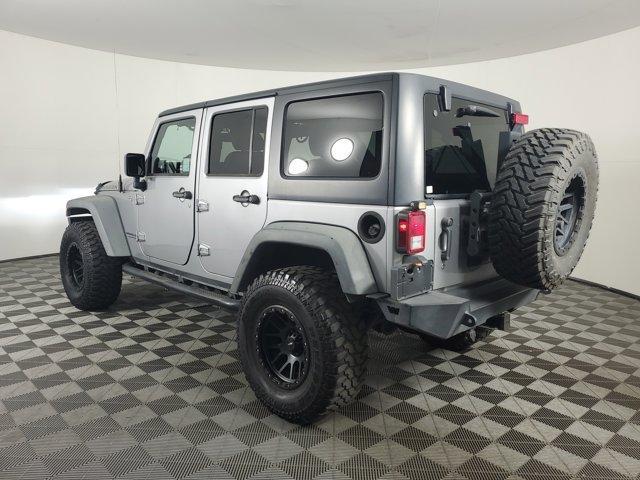 used 2013 Jeep Wrangler Unlimited car, priced at $26,671