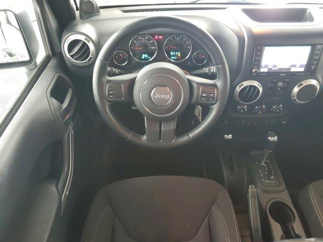 used 2013 Jeep Wrangler Unlimited car, priced at $26,671