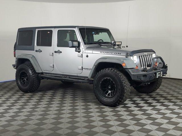 used 2013 Jeep Wrangler Unlimited car, priced at $26,671