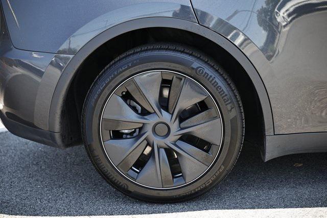 used 2024 Tesla Model Y car, priced at $32,990