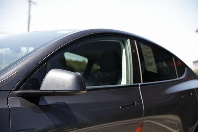 used 2024 Tesla Model Y car, priced at $32,990