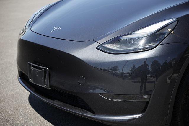 used 2024 Tesla Model Y car, priced at $32,990
