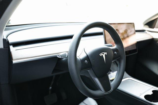 used 2024 Tesla Model Y car, priced at $32,990