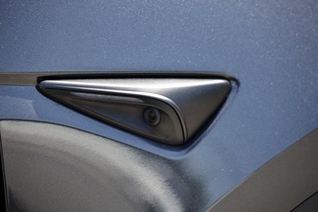 used 2024 Tesla Model Y car, priced at $32,990