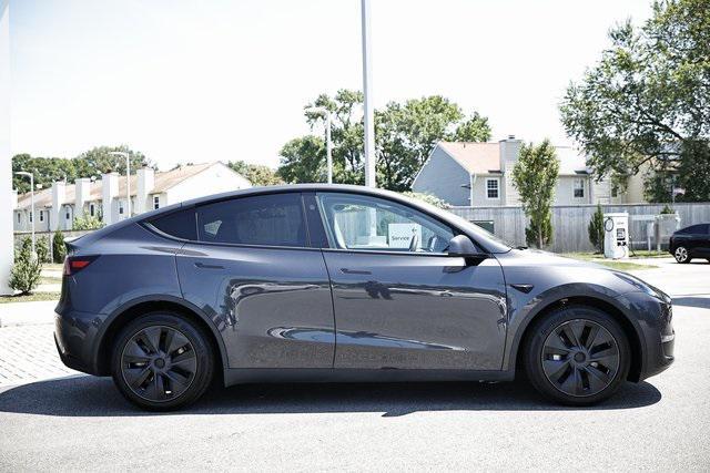 used 2024 Tesla Model Y car, priced at $32,990