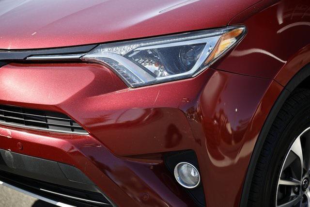 used 2018 Toyota RAV4 Hybrid car, priced at $17,990