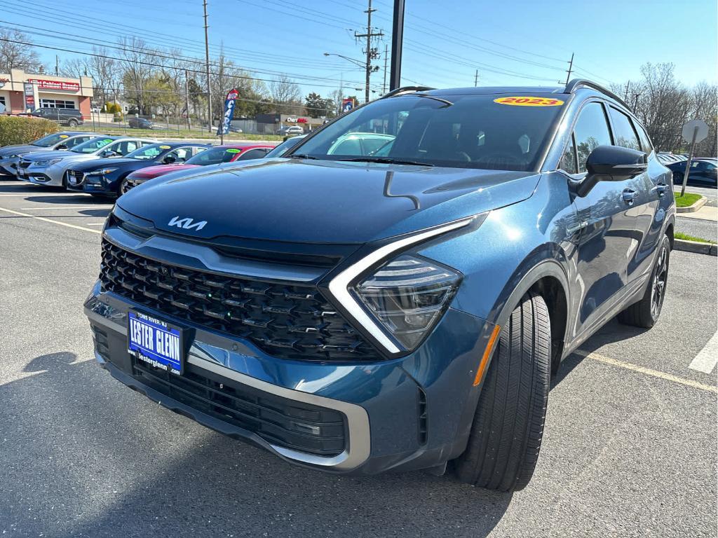 used 2023 Kia Sportage Plug-In Hybrid car, priced at $32,237