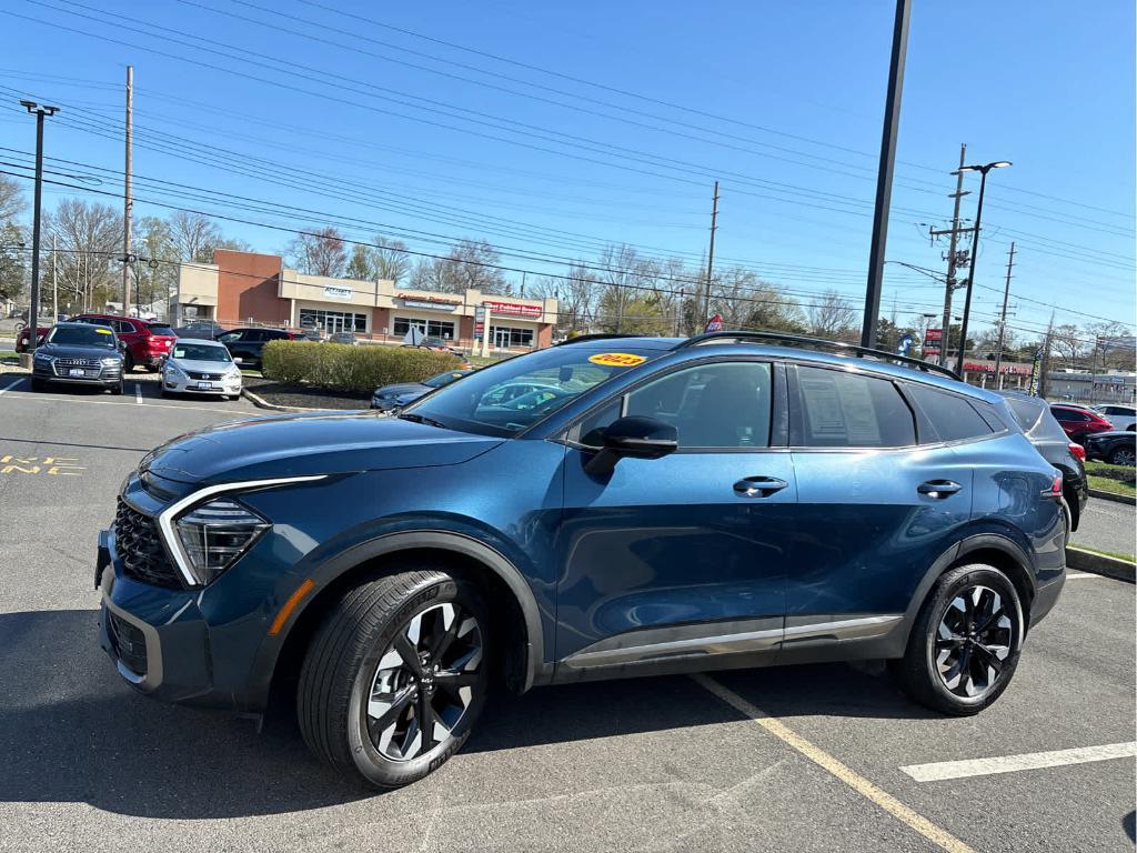 used 2023 Kia Sportage Plug-In Hybrid car, priced at $32,237