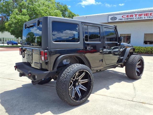 used 2010 Jeep Wrangler Unlimited car, priced at $13,849